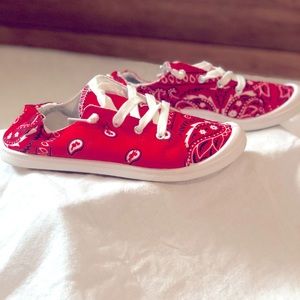 Adorable red bandanna sneakers.